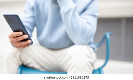Hand man using smart phone for Searching Browsing Internet Data Information Networking Concept - Shutterstock ID 2311986275