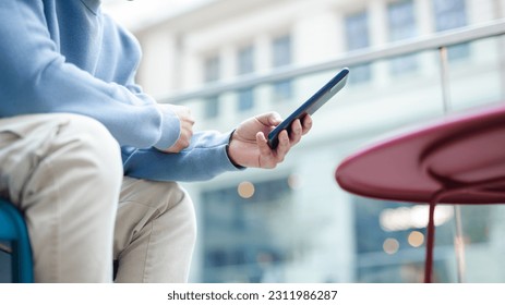 Hand man using smart phone for Searching Browsing Internet Data Information Networking Concept - Shutterstock ID 2311986287