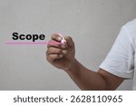 Hand of man write text Scope on gray background. Concept of adoption to promote your business for organization