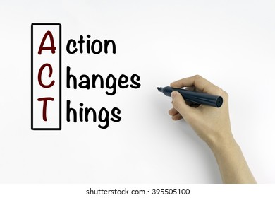 Hand with marker writing Action Changes Things (ACT), business concept