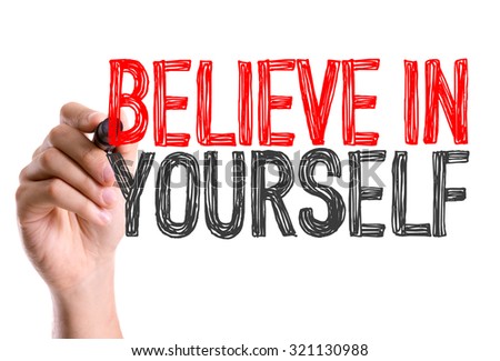 Hand with marker writing: Believe in Yourself