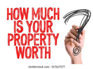 Hand with marker writing: How Much Is Your Property Worth?
