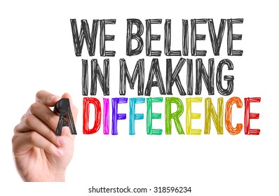 Hand With Marker Writing: We Believe In Making A Difference