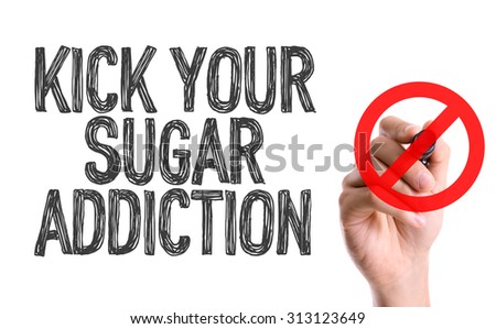 Hand with marker writing the word Kick Your Sugar Addiction