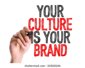 Hand with marker writing: Your Culture Is Your Brand