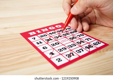 Hand Marking Bingo Winning Numbers Stock Photo (Edit Now) 1219250908