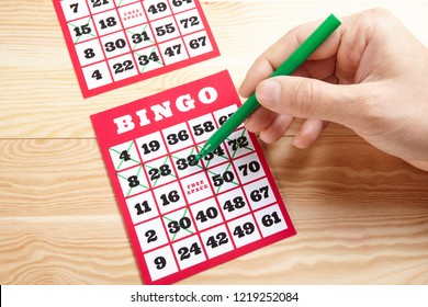 Hand Putting First Chip Bingo Game Stock Photo (Edit Now) 214186168
