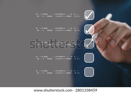 Hand marking checklist with checkboxes, task management and productivity, business planning, workflow organization, goal tracking, quality control, project management and efficient process completion