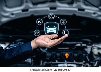 Hand of mechanic holding car icon, Car automobile insurance and car services concept. - Powered by Shutterstock