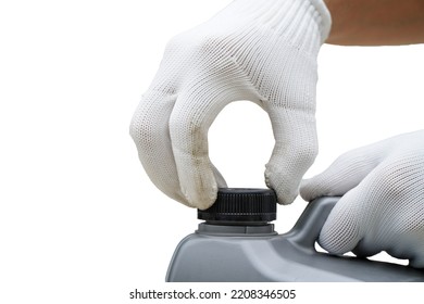 Hand Of A Mechanic Opening A Gray Plastic Canister For Engine Oil On A White Background.periodic Oil Change Concept
