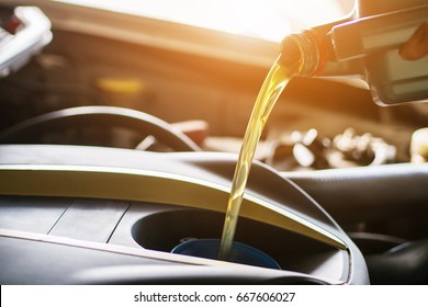 Hand mechanic in repairing car,Change the Oil 