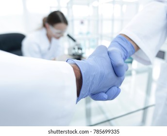 Hand In The Medical Glove (handshake)