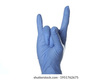 Hand In Medical Glove Shows Rock Gesture, Isolated On White Background