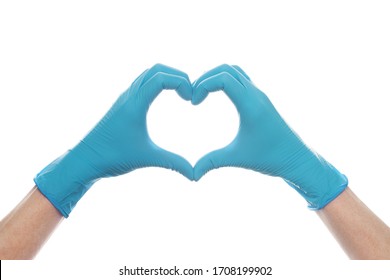 Hand In Medical Gloves Showing Heart Isolated On White Background