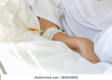 Baby’s Hand With Medicine Dropper. Child On A Drip In The Hospital. Illness Or Sickness. Healthcare Service And Child Treatment In The Hospital Room