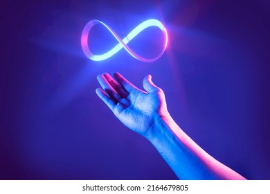 Hand of men pointing on endless infinity sign of virtual reality metaverse digital innovation game or internet online simulation media cyber and world   background