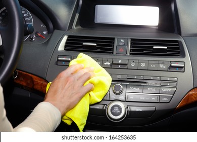 Hand With Microfiber Cloth Cleaning Car.