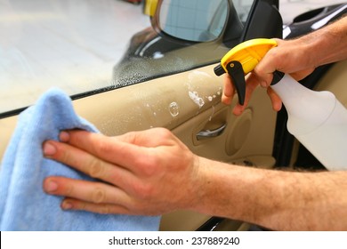 Hand With Microfiber Cloth Cleaning Car.