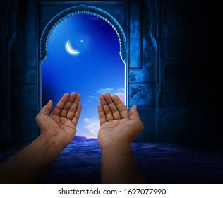 Hand of Muslim man praying with mosque interior background. Islamic wallpaper concept of eid, Ramadan, prayer and Shab e barat.