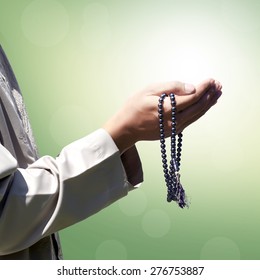 Hand Of Muslim People Praying With Abstract Background