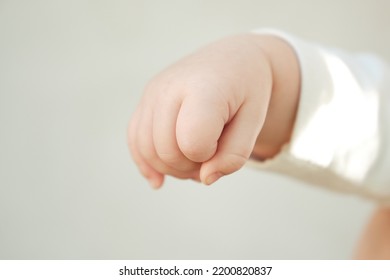 Hand Of A Newborn Baby Close Up. Folds Baby Hand