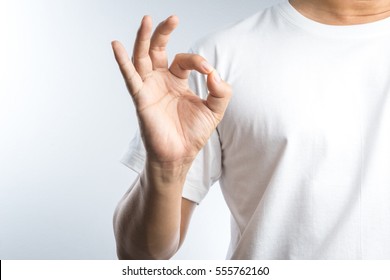hand ok sign on white background - Shutterstock ID 555762160