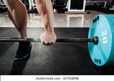 Hand On The Barbell. Young Athlete Getting Ready For Weight Lifting Training