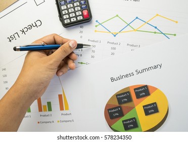 Hand on Business summary or Business plan report with Charts and graphs in Business concept, vintage style