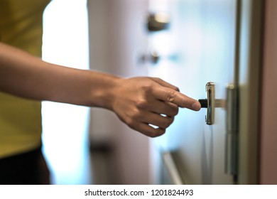 Hand On Door Bell. Finger Ringing Doorbell. Neighbor Or Female Guest Surprise Visiting. 