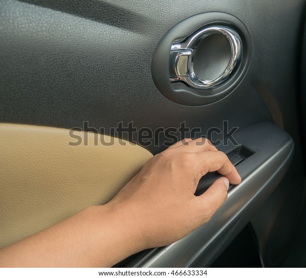 Hand on door\
car.