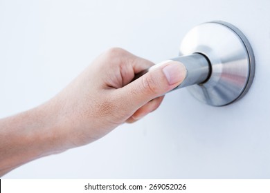 Hand On A Door Handle To Open The Door