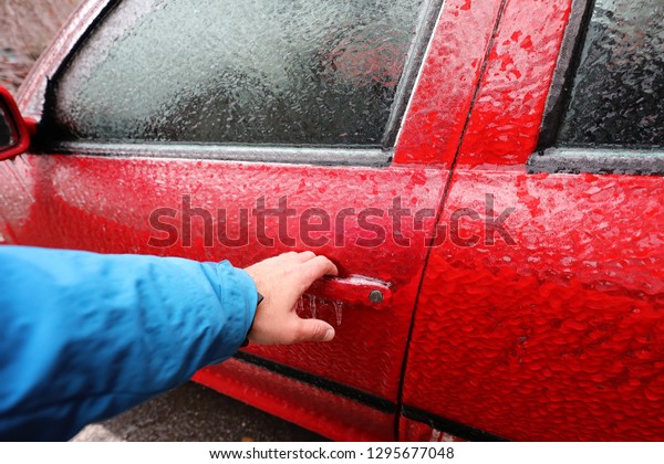 Hand On Freezing Car Door Handle Stock Photo Edit Now 1295677048