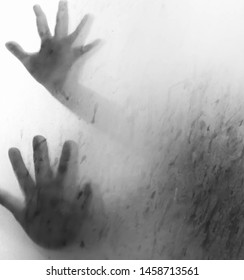 Hand On Glass Shower Door Stands Behind Steam Blurred Glass With Water Drops. Rest At Bathroom Black And White Background.