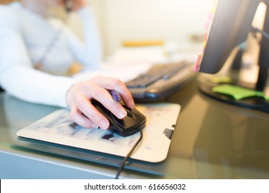 Hand On The Mouse Of A Girl In Business Office