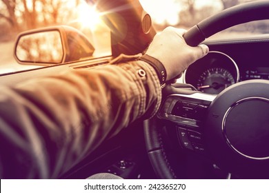 Hand On Wheel Car Driving.  Driving Modern Car Steering Wheel And The Hand Closeup.