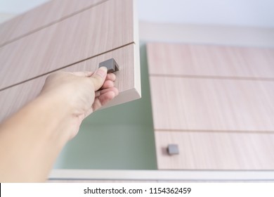 Hand Open Cabinet