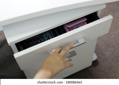 Hand To Open The Drawer