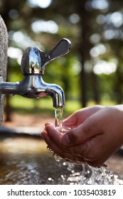 Hand Open For Drinking Tap Water In Asia