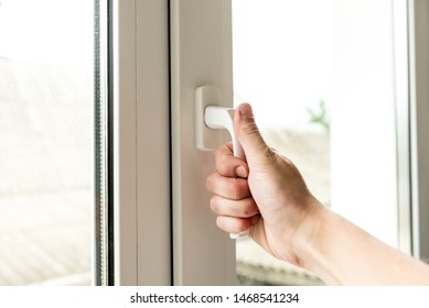 Hand Open Window At Home.