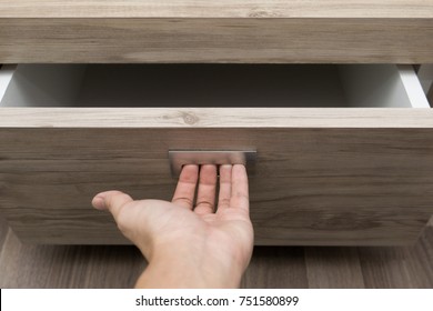 The Hand Open Wood Drawer