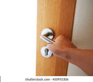 Hand Opening Door Knob With White Background Dream Concept