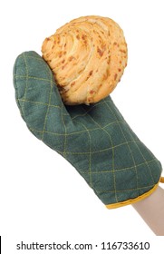 Hand In Oven Mitt Holding Bun