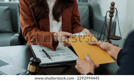 Hand over banknotes, Bribery of female asia japanese chinese lawyer people earn dollars after winning a lawsuit. extorting money from clients in legal cases
