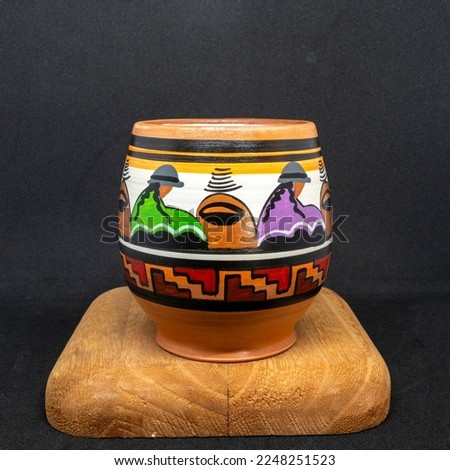 Hand painted andean mug. illustration of cusquenian women. peruvian handicraft.