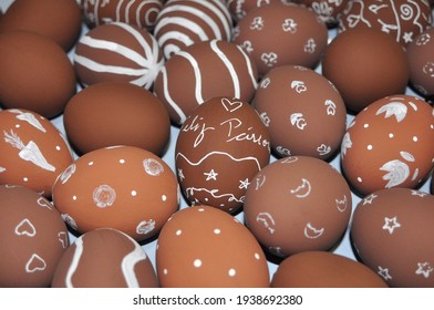 Hand painted chicken eggs for Easter decoration, imitating chocolate eggs