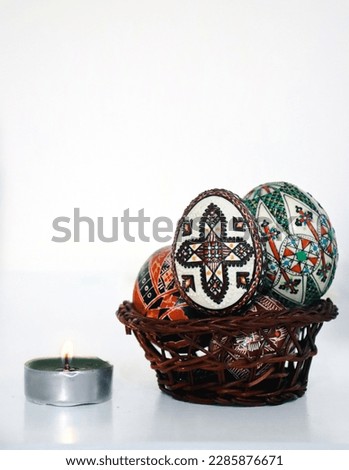 Hand painted Easter eggs. Traditional Easter decorations made by folk craftsmen from Bucovina, Romania. Painted Easter models, the sign of the cross and. Bunny decoration. Happy Easter