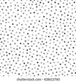 Hand painted seamless pattern with light black painted dots.