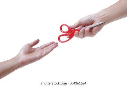 Hand Passing A Pair Of Red Scissors Safely To The Other Hand / A Safe Way To Hold Scissors