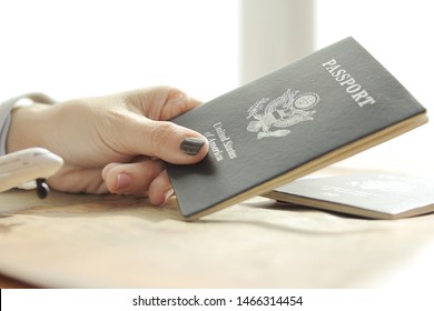 Hand With Passport Travel Concept , US Passports Travel Concept