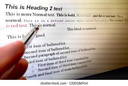 Hand With Pen Indicate Text Formatting Rules On Word Processor Software On Computer Screen